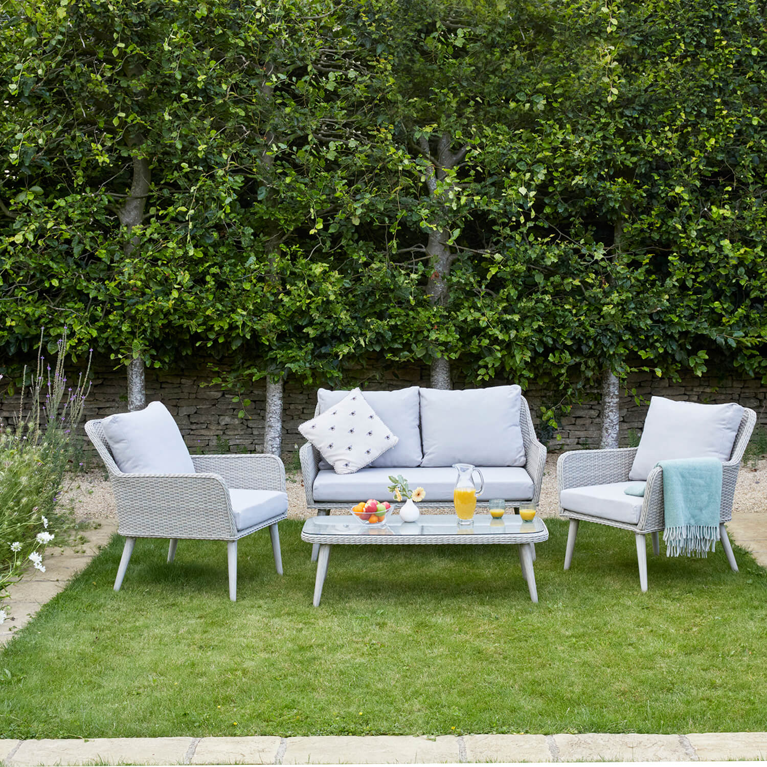 Paxton Rattan Sofa Garden Furniture Set  2 Seater Sofa  Table And 2 Chairs  Glass Top Coffee Table  Cream Cushions And Weave  Gardenesque